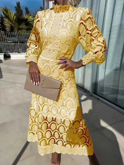 Elegantes Spitzenkleid mit Puffärmeln