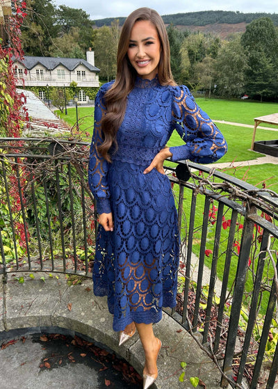 Elegantes Spitzenkleid mit Puffärmeln